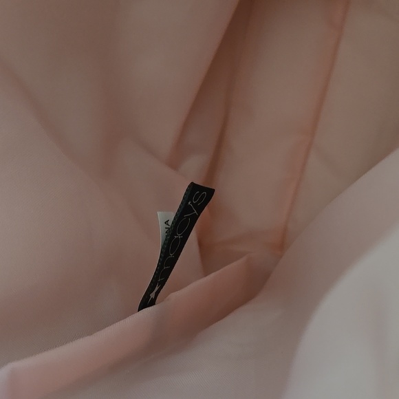 New w/tag never used Light pink tote bag w/ 2 hanging tassles wrapped in plastic - Picture 4 of 6